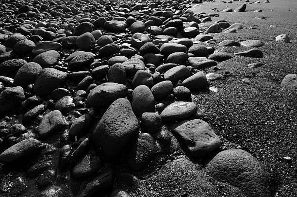 Black stones beach in Indonesia