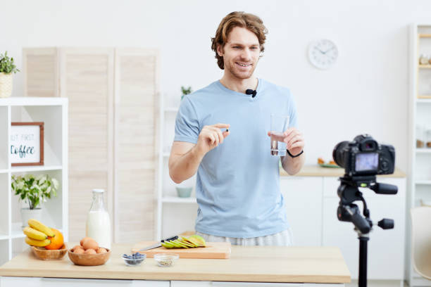 istock Man shooting blog about health 1248661908