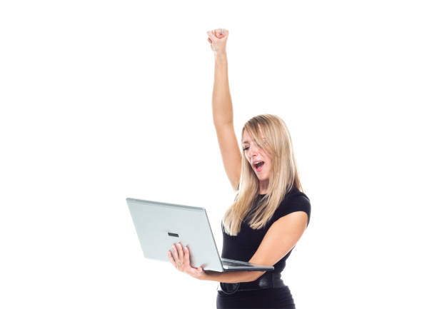 caucasian young women business person standing in front of white background wearing dress and using computer - thank you excitement waist up horizontal imagens e fotografias de stock