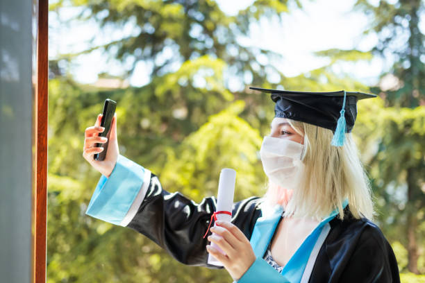 istock High School Student taking Selfie with Face Mask during Covid-19 1248664635