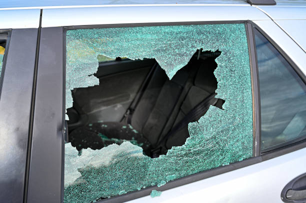 istock car with shattered glas windows in Sweden 1248665605