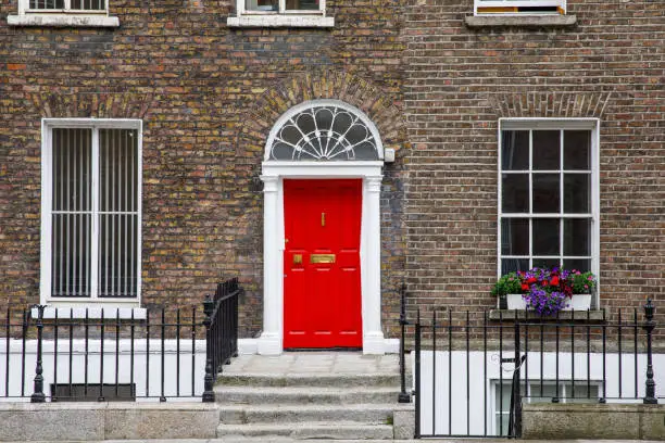 Photo of Colorful georgian doors in Dublin, Ireland. Historic doors in different colors painted as protest against English King George legal reign over the city of Dublin in Ireland