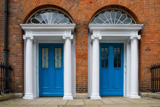 Photo of Colorful georgian doors in Dublin, Ireland. Historic doors in different colors painted as protest against English King George legal reign over the city of Dublin in Ireland