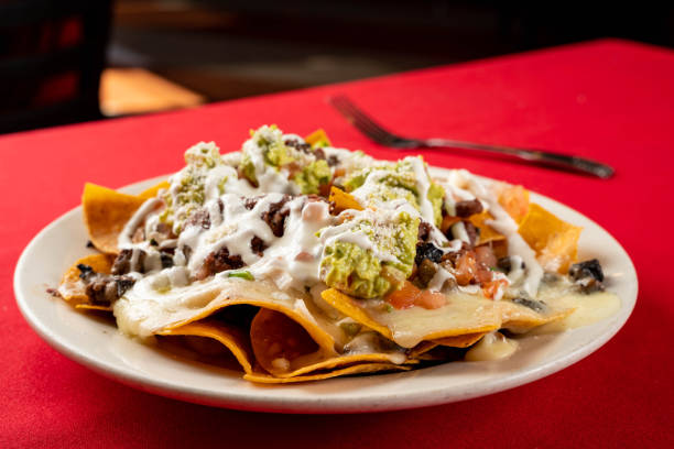 istock nachos Mexicanos  Mexican loaded nachos  close up 1248671396