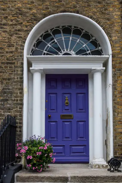 Photo of Colorful georgian doors in Dublin, Ireland. Historic doors in different colors painted as protest against English King George legal reign over the city of Dublin in Ireland