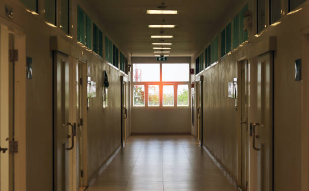 istock The corridor wallkway in the laboratory building.  walk through survey for safety checking, can use as a background interior field or building part background. Area way can walking. has sunlight. 1248671677