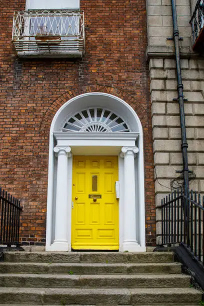 Photo of Colorful georgian doors in Dublin, Ireland. Historic doors in different colors painted as protest against English King George legal reign over the city of Dublin in Ireland