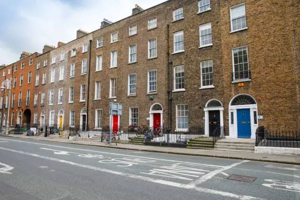 Photo of Colorful georgian doors in Dublin, Ireland. Historic doors in different colors painted as protest against English King George legal reign over the city of Dublin in Ireland