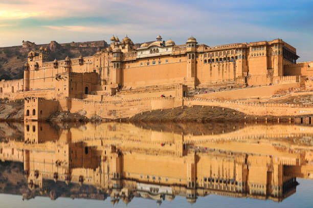 istock Amber Fort medieval architecture at Jaipur Rajasthan India with mirror reflection on Maotha lake 1248673011