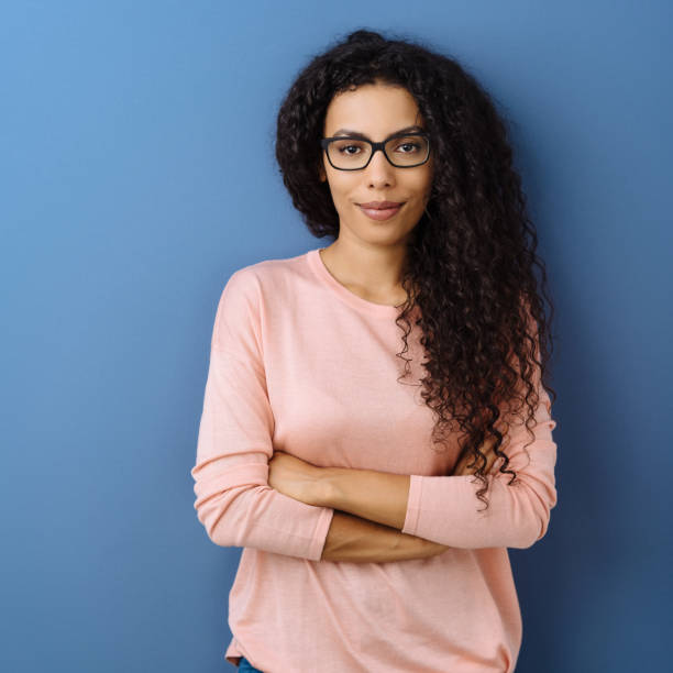 istock Self-assured young woman wearing glasses 1248673947
