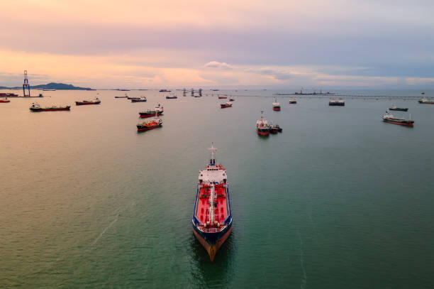 Aerial view of tanker ship transportation oil. Aerial view tanker ship vessel unloading at port, Business import export oil and gas petrochemical. industrial ship photos stock pictures, royalty-free photos & images