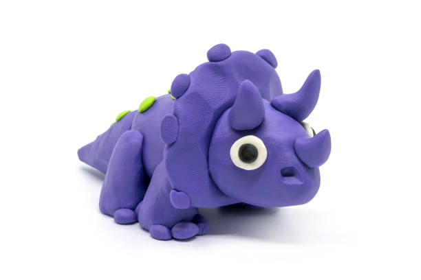 istock Play dough Triceratopson on white background 1248675066