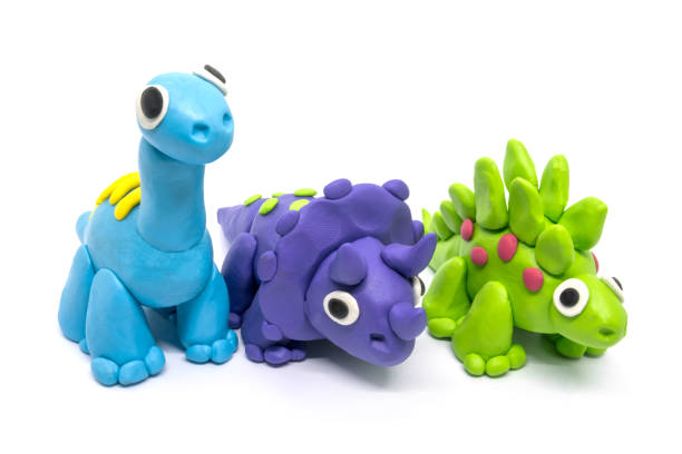 istock Play dough group Brachiosaurus, Triceratopson, Stegosaurus, on white background 1248675079