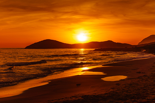 Sunset over sea. Seaside landscape. Calblanque Beach, Murcia Spain.