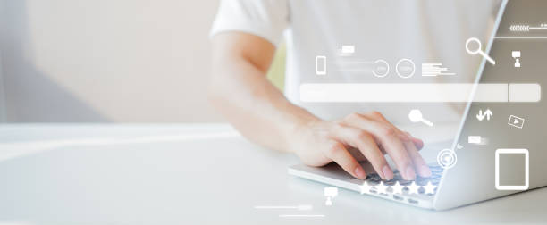 close up man hand type on keyboard laptop to use search engine optimization (SEO) tools for finding customer or promote and advertise about content online for marketing technology and business concept close up man hand type on keyboard laptop to use search engine optimization (SEO) tools for finding customer or promote and advertise about content online for marketing technology and business concept seo services stock pictures, royalty-free photos & images