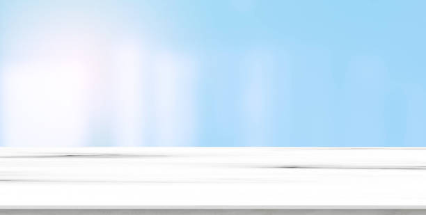 istock blurred inside of interior luxury modern bathroom in the morning panoramic background with white marble pattern tabletop for show, promote ads and design product on display concept 1248678354