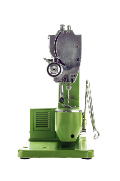 istock close front view of an old vintage green sewing machine on black background 1248685083
