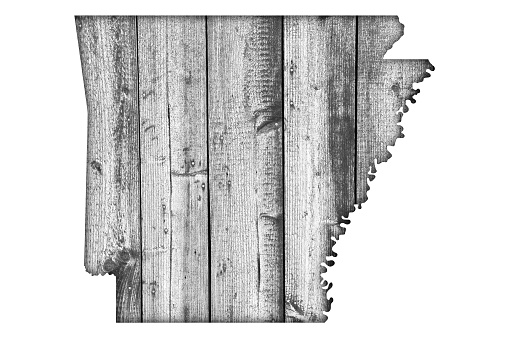Map of Arkansas on weathered wood