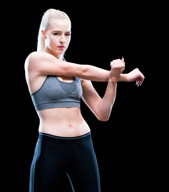 istock Caucasian female exercising wearing bra 1248687893