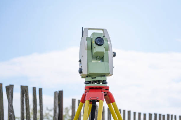 geodetic total station measures distances and angles for the preparation of map data on sunny day