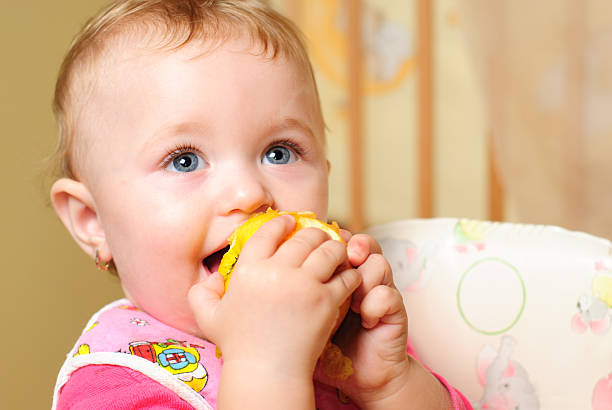 istock Girl eating apple 124868842