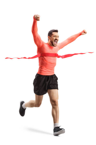 istock Young man running a race on the finish line 1248692523