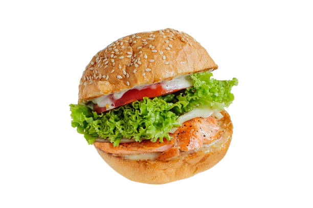 istock Tasty burger with salmon isolated on white background 1248693040
