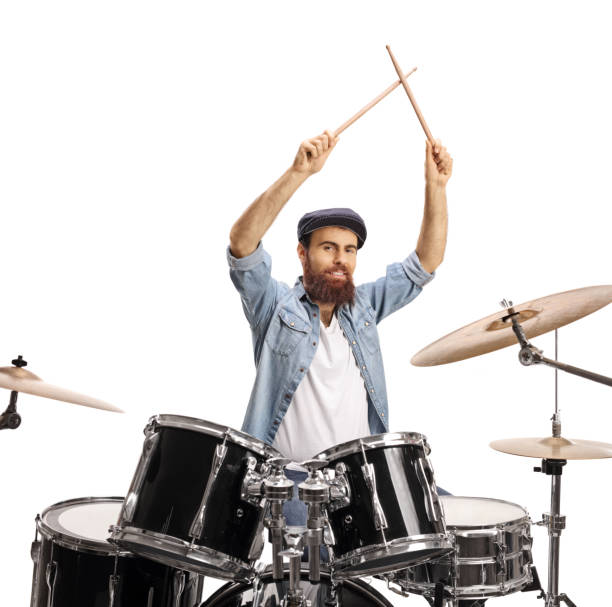 istock Bearded guy with drumsticks starting to play drums 1248693077