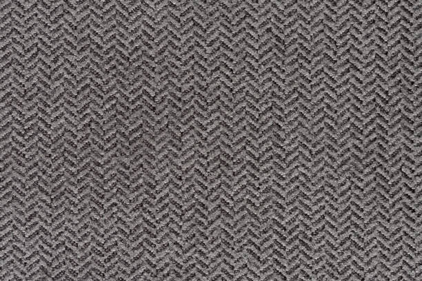 istock Contrast relief textile background in grey tone. 1248693500