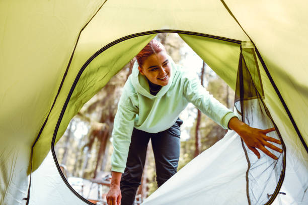 istock Cute Female Entering Tent 1248693869