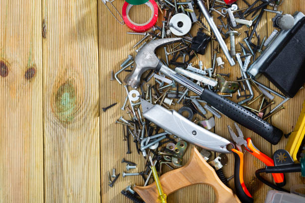 istock Hand tools for repairing on wooden surface in workshop 1248695055