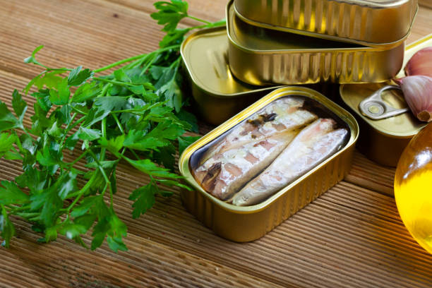 istock Preserved mackerel fish on wooden table 1248695066