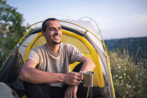 istock Young Man Camping In Mountain. 1248696194