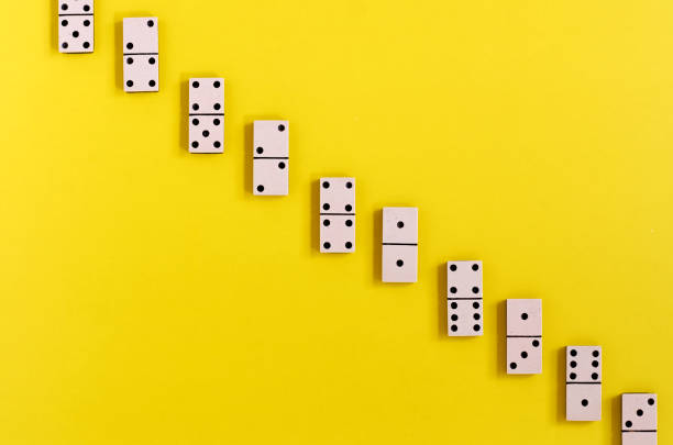 istock vintage old white Domino on a yellow background 1248696958