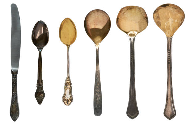 istock vintage knife and spoons on white background 1248697423