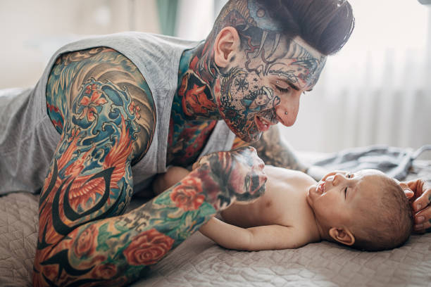 Muscular Build Men Tattoo Male Beauty Stock Photos, Pictures & Royalty-Free  Images - iStock