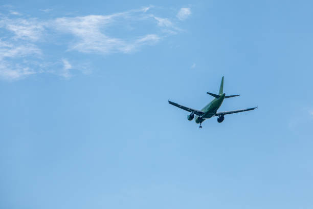 istock airplane in sky travel concept 1248701076
