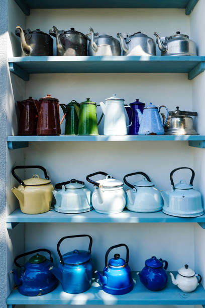 istock sunshine on retro and colorful teapots on shelves 1248701311