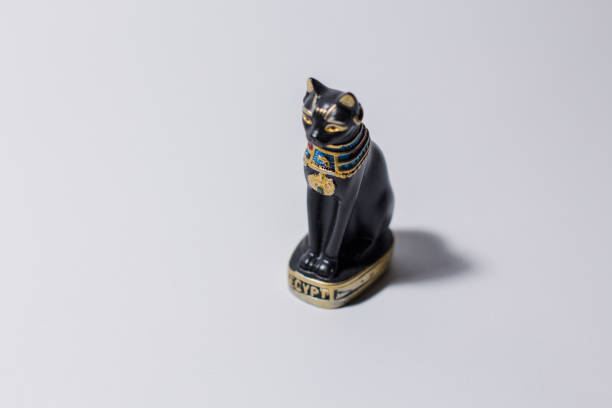 istock egyptian cat statue on white background 1248701532