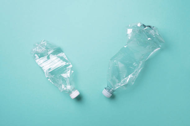 istock Plastic bottles on blue background. top view. Recycle plastic, waste pollution concept. Top view, copy space. Environmental protection concept. Reuse garbage, plastic free. Earth, world water day 1248703781
