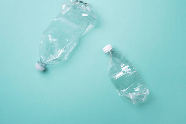 istock Plastic bottles on blue background. top view. Recycle plastic, waste pollution concept. Top view, copy space. Environmental protection concept. Reuse garbage, plastic free. Earth, world water day 1248703798