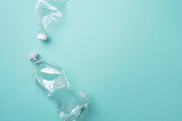 istock Plastic bottles on blue background. top view. Recycle plastic, waste pollution concept. Top view, copy space. Environmental protection concept. Reuse garbage, plastic free. Earth, world water day 1248703805