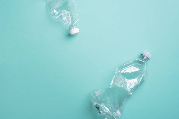 istock Plastic bottles on blue background. top view. Recycle plastic, waste pollution concept. Top view, copy space. Environmental protection concept. Reuse garbage, plastic free. Earth, world water day 1248703807