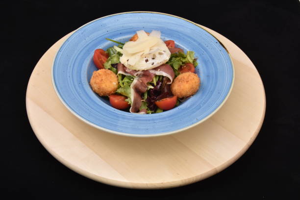 istock salad with tomatoes, smoked ham,cheese and mayonnaise 1248703885