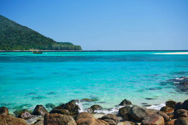 istock Turquoise sea on tropical island 1248704896