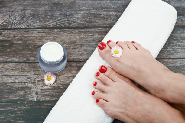 istock Female legs on a white towel 1248706335