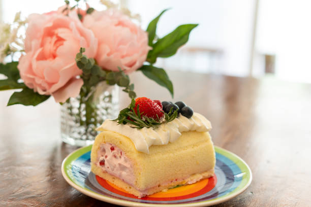 istock Cake Rolls decorated with fruit, strawberry, blueberries, raspberries. 1248706630