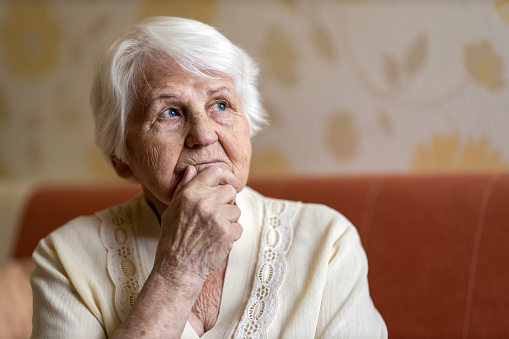 Portrait of an elderly woman in a state of worry