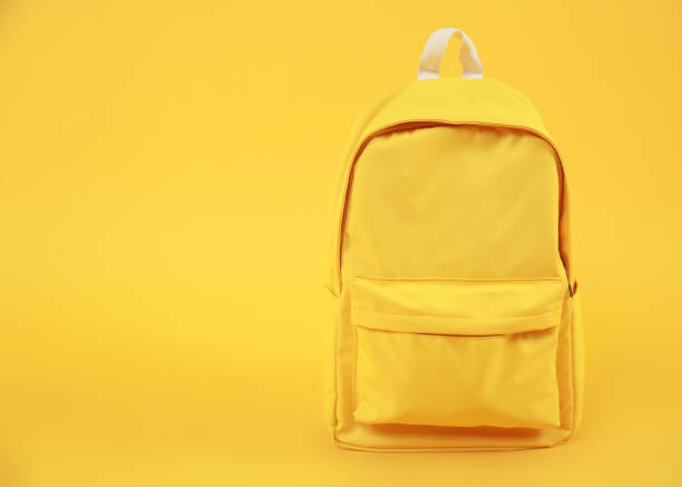 istock Yellow backpack empty space background,travel concept.Rucksack education symbol.Back to school. 1248711453