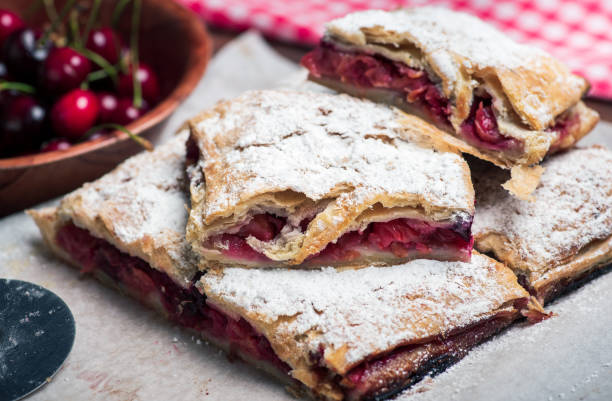 istock Homemade sweet cherry fruit pie on a cutting board 1248713392
